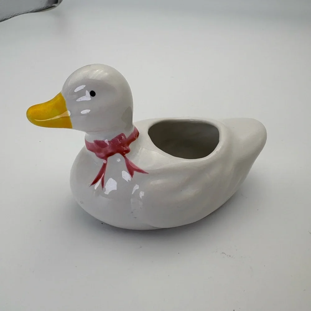 Charming White Duck Planter with Red Bow